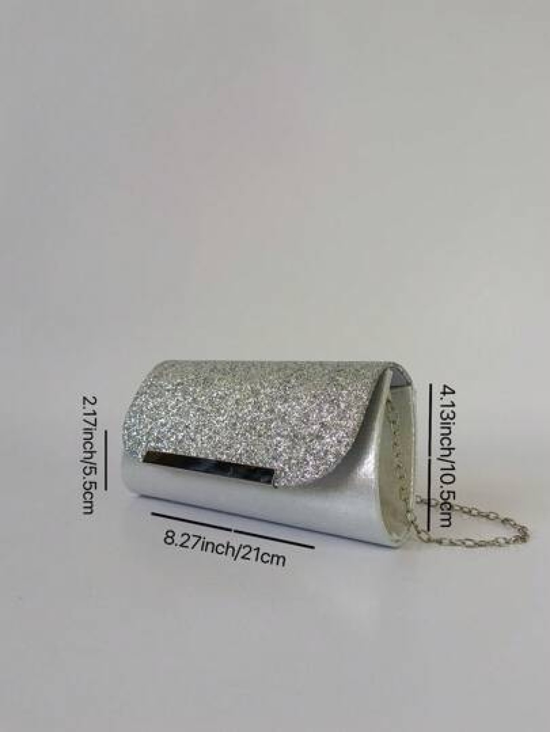 This Evening Bag Features A Sophisticated Design The Main Body Is Made Of Shimmering Silver Sequins That Glimmer And Shine Under Light Exuding A Luxurious And Glamorous Look The Classic Clutch Silhoue