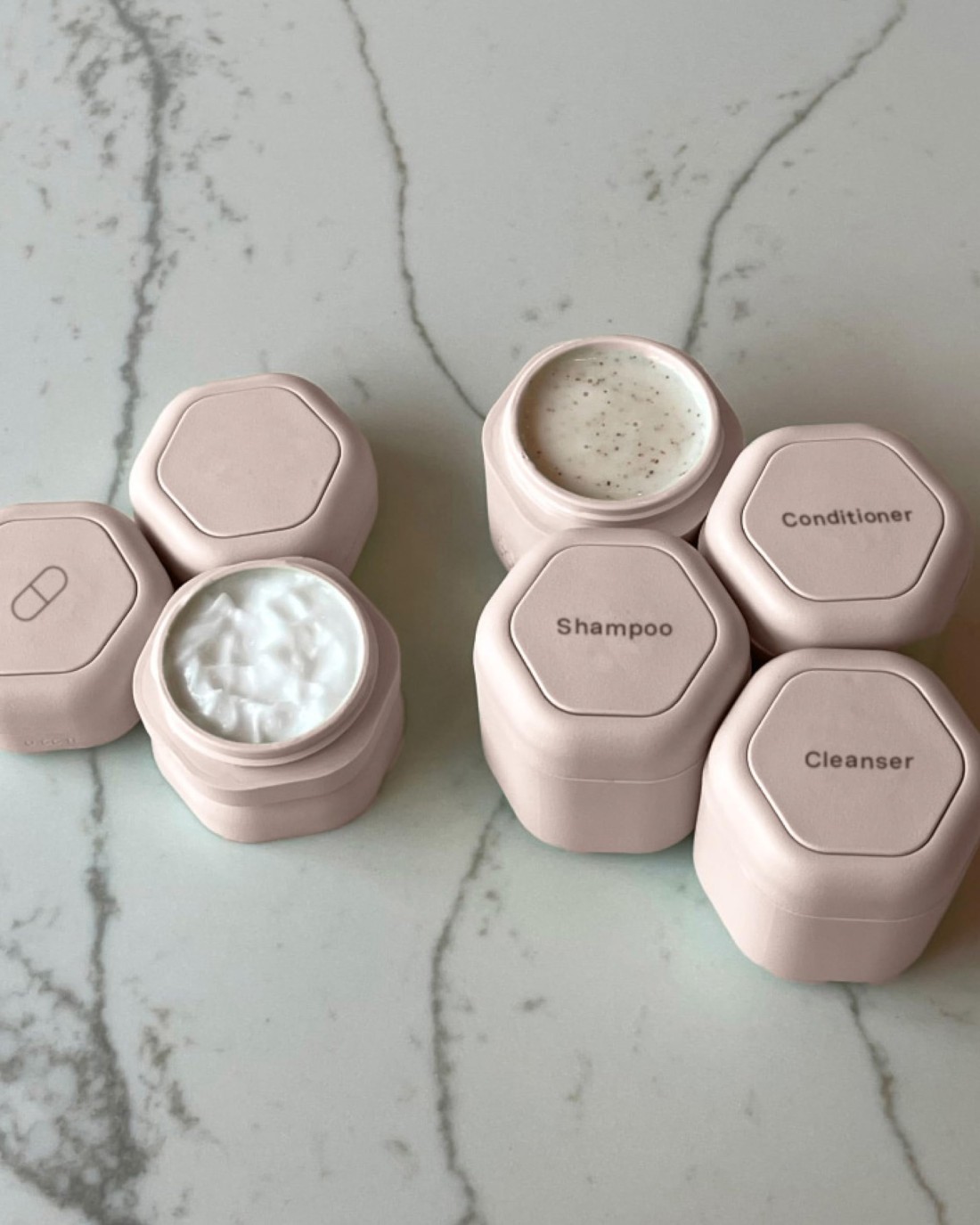 CadenceTravel Containers Daily Routine Capsule Set Magnetic Travel Capsules For Shampoo Conditioner Body Wash Pills and More 4 Flex Mediums 132oz 3 Flex Smalls 056oz Petal