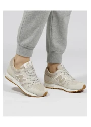 New Balance حذاء رياضي بيج للجنسين - حذاء رياضي كاجوال