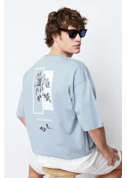 Trendyol Collection تي شيرت قطني واسع القطع مطبوع عليه زهور رمادية - TMNSS21TS1223
