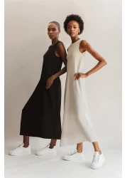 Trendyol Modest فستان محبوك من القطن 100% باللونين الأسود والبيج الفاتح حزمة من قطعتين - TCTAW22UK0110