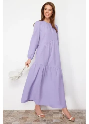 Trendyol Modest فستان منسوج من القطن ذو قصة واسعة بتفاصيل رباط أرجواني TCTSS21EL3470