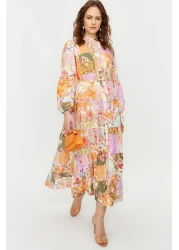 Trendyol Modest فستان منسوج متعدد الألوان من الكتان المزخرف بنقشة الزهور مع تفاصيل حزام TCTSS24EB00042
