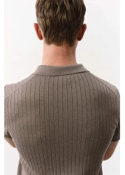 H&M قميص بولو ضيق من نسيج مضلع