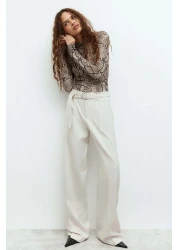 H&M Belted tailored trousers