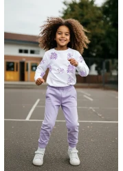 TRENDYOLKIDS طقم علوي محبوك بالزهور للفتيات من إكرو TKDAW25AU00162