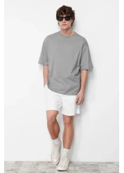 Trendyol Collection تي شيرت قطني واسع القطع مطبوع عليه زهور رمادية - TMNSS21TS1223