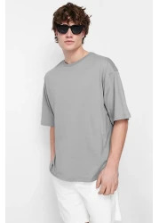 Trendyol Collection تي شيرت قطني واسع القطع مطبوع عليه زهور رمادية - TMNSS21TS1223