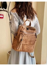 حقيبة ظهر جلدية صناعية مع شرابة أنيقة للنساء - متعددة الاستخدامات ، مقاومة للماء ، مع أشرطة قابلة للتعديل وإغل