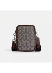 Coach حقيبة كروسبودي رجالية ستانتون، محفظة جلد صغيرة لهاتف محمول وبطاقات ذات تصميم تذكاري، محمولة على الكتف بسي