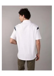 American Eagle قميص بولو بأكمام متباينة من AE