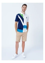 U.S. Polo Assn. تي شيرت بولو بياقة بولو للرجال باللون الأزرق الداكن تي-انيا.