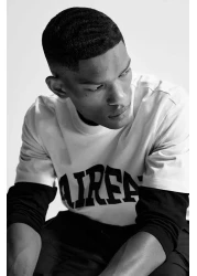 H&M تي شيرت فضفاض مطبوع