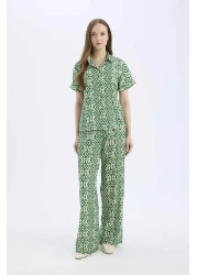 Defacto قميص بأكمام قصيرة منقوش بقصة عادية C9621AX25SP