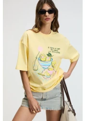 GRIMELANGE تي شيرت نسائي من NITZA مصنوع من القطن بنسبة 100% برقبة دائرية كبيرة الحجم باللون الأصفر