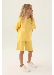 U.S. Polo Assn. يو اس بولو اسن. طقم برمودا تي شيرت وشورت أصفر للفتيات