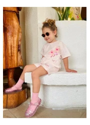 Next Baby طقم علوي من Laciel Paris من التول الوردي الناعم مع شورت بأكمام قصيرة