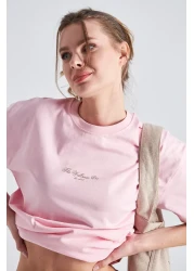 The Champ Clothing تي شيرت نسائي كبير الحجم مطبوع عليه The Wellness Era مصنوع من القطن بنسبة 100%