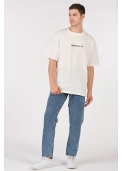 to COSMOS تي شيرت للجنسين (رجال - نساء) مقاس كبير (فضفاض-سلاش) لون إكرو (أبيض) لا تقدم أبدًا