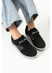 BOUIS حذاء رياضي للأطفال من الجلد الصناعي المرن باللونين الأبيض والأسود - حذاء رياضي من سلسلة M