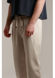 TKT بنطال بيكيه فضفاض للرجال