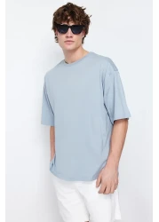 Trendyol Collection تي شيرت قطني واسع القطع مطبوع عليه زهور رمادية - TMNSS21TS1223