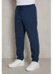 firststops بنطال رجالي من الكتان باللون الأزرق الداكن بقصة فضفاضة ومريح