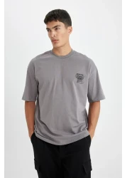 Defacto تي شيرت رمادي كبير الحجم للرجال - رقبة دائرية، طباعة خلفية، قطن، كم قصير D4908ax24au