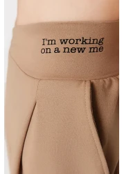  Collection Beige Print Detailed Wide Leg/Relaxed Cut Asymmetrical Waist Knitted Trousers TWOAW23PL00389