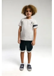 U.S. Polo Assn. بدلة برمودا كريمية للأولاد