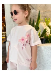 Next Baby طقم علوي من Laciel Paris من التول الوردي الناعم مع شورت بأكمام قصيرة