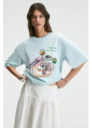 GRIMELANGE تي شيرت نسائي من NITZA مصنوع من القطن بنسبة 100% برقبة دائرية كبيرة الحجم باللون الأزرق