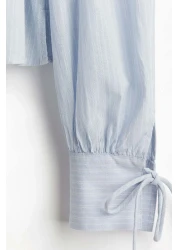 H&M بلوزة قطنية بتفاصيل ربطة عنق