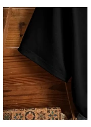 qubo sportswear & company تي شيرت qubo للجنسين من القطن المطبوع ذو رقبة دائرية وأكمام قصيرة باللون الأسود