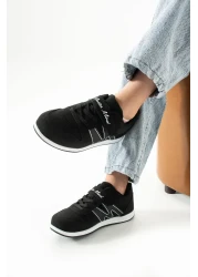 BOUIS حذاء رياضي للأطفال من الجلد الصناعي المرن باللونين الأبيض والأسود - حذاء رياضي من سلسلة M