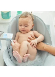 Frida Baby Soft Sink Baby Bath Seat Sink Bather for Baby Easy to Clean Baby Bathtub Bath Cushion That Supports Babys Head