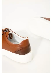 GERARDO AYAKKABI حذاء رياضي من الجلد الطبيعي للرجال باللون البني