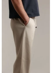 TKT بنطال بيكيه فضفاض للرجال