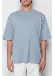 Trendyol Collection تي شيرت قطني واسع القطع مطبوع عليه زهور رمادية - TMNSS21TS1223