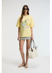 GRIMELANGE تي شيرت نسائي من NITZA مصنوع من القطن بنسبة 100% برقبة دائرية كبيرة الحجم باللون الأصفر