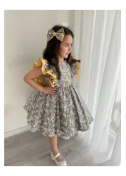 Sare Çocuk Giyim فستان بناتي بتصميم خاص على شكل زهرة صفراء على الكتف منتفخة (100% قطن) + إبزيم