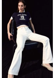 H&M بنطال جينز واسع الساق