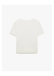 Koton تي شيرت قطني مطبوع عليه زهور بأكمام قصيرة وياقة دائرية