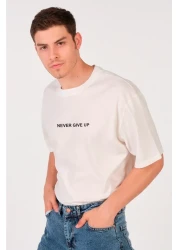 to COSMOS تي شيرت للجنسين (رجال - نساء) مقاس كبير (فضفاض-سلاش) لون إكرو (أبيض) لا تقدم أبدًا