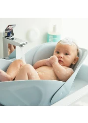 Frida Baby Soft Sink Baby Bath Seat Sink Bather for Baby Easy to Clean Baby Bathtub Bath Cushion That Supports Babys Head