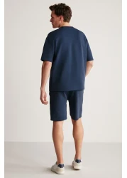 GRIMELANGE تيشيرت رجالي باللون الأزرق الداكن بجيوب من Artur وقماش سميك ذو ملمس خاص