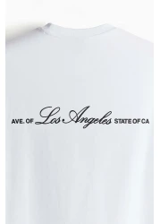 H&M تي شيرت فضفاض مطبوع