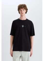 Defacto تي شيرت 100% قطن الفايكنج فالهالا بوكسي بياقة دائرية وطباعة خلفية وأكمام قصيرة E3277AX25SM