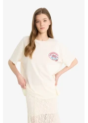 Defacto تي شيرت رائع ذو قصة واسعة وياقة دائرية وأكمام قصيرة مطبوعة من الخلف F4787ax25sm