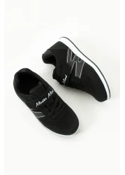 BOUIS حذاء رياضي للأطفال من الجلد الصناعي المرن باللونين الأبيض والأسود - حذاء رياضي من سلسلة M